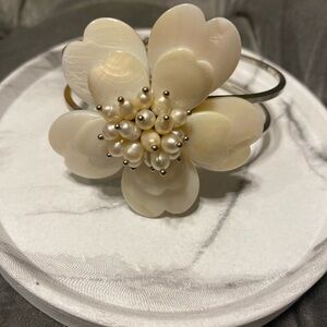 Hinged flower bracelet silver tone
